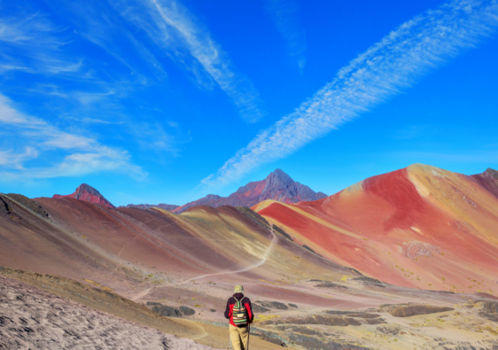 Stunning Rainbow Mountain Peru, Vinicunca - a breathtaking landscape of multicolored stripes in the Peruvian Andes